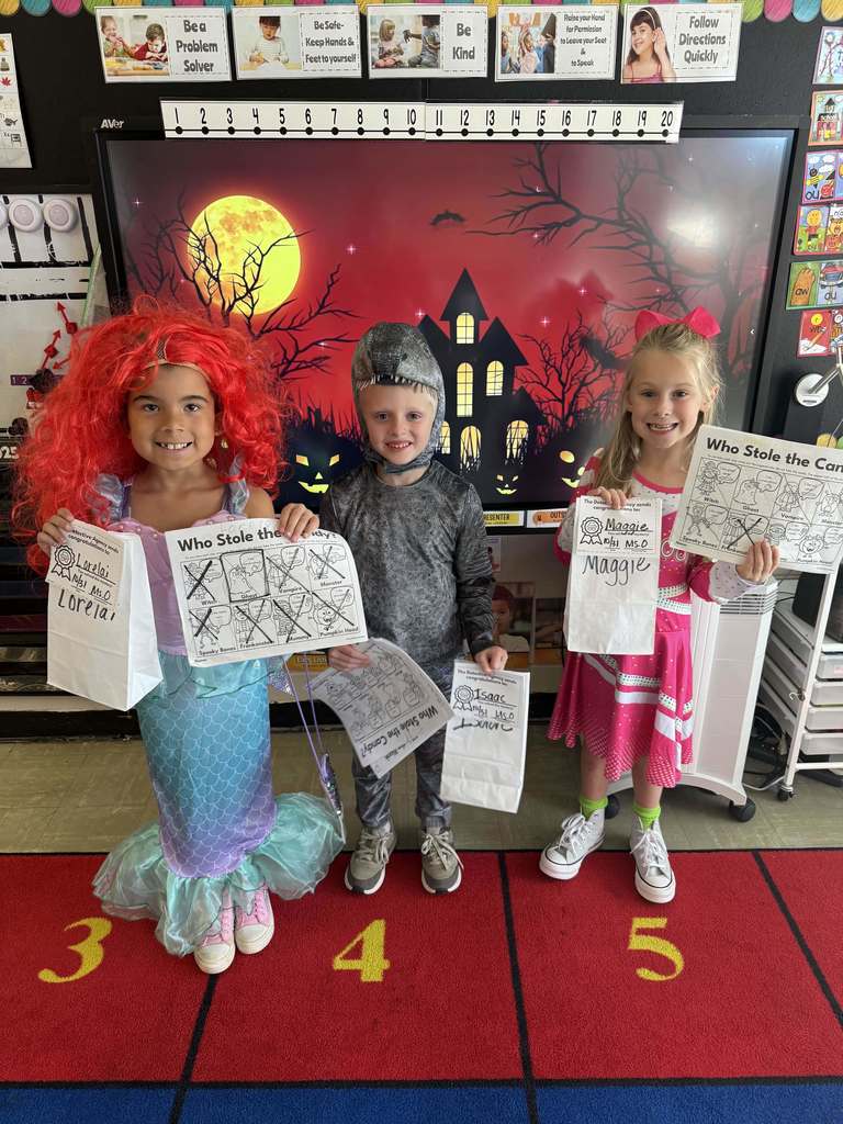 Photo shows a Halloween classroom math mystery challenge that students completed.