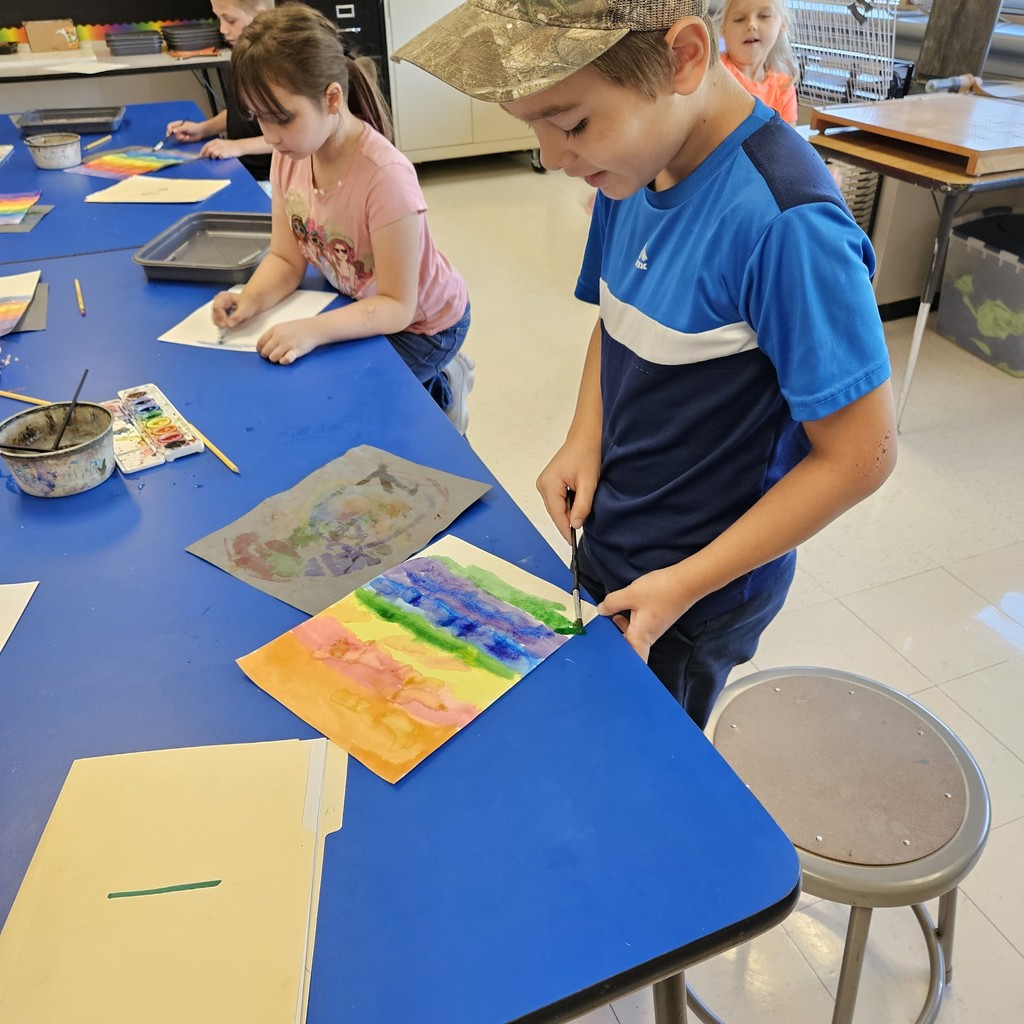 The photo shows 3rd graders at Zitzman Elementary creating and learning during art. 