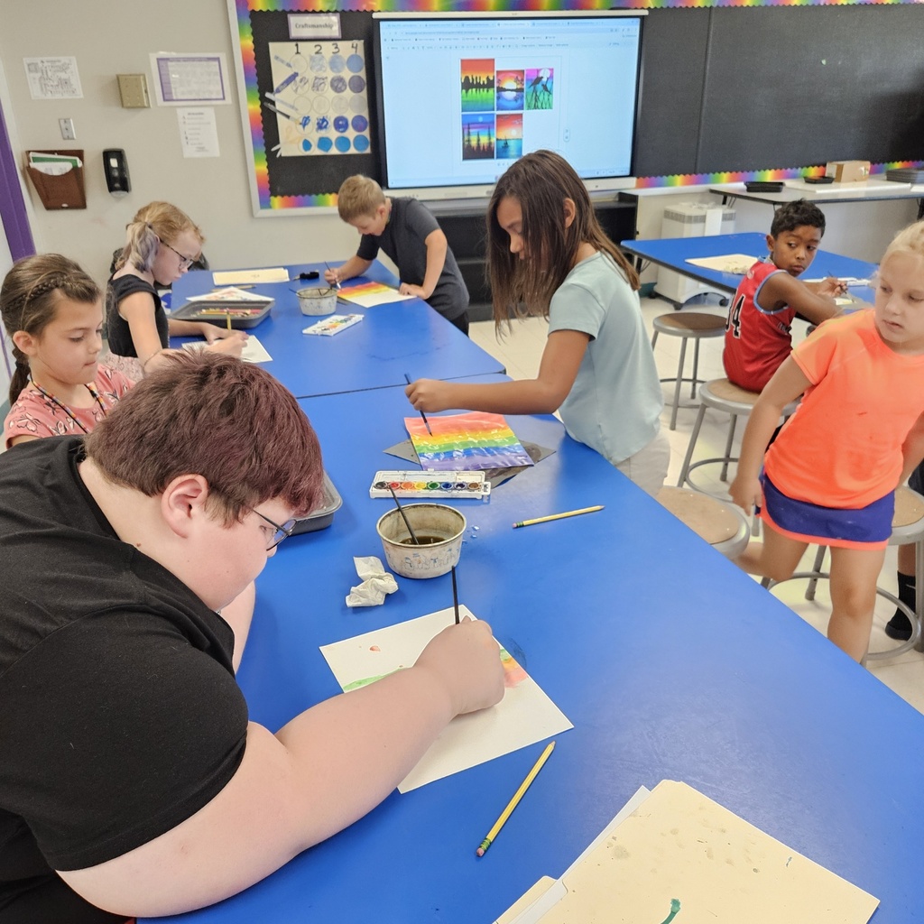 The photo shows 3rd graders at Zitzman Elementary creating and learning during art. 