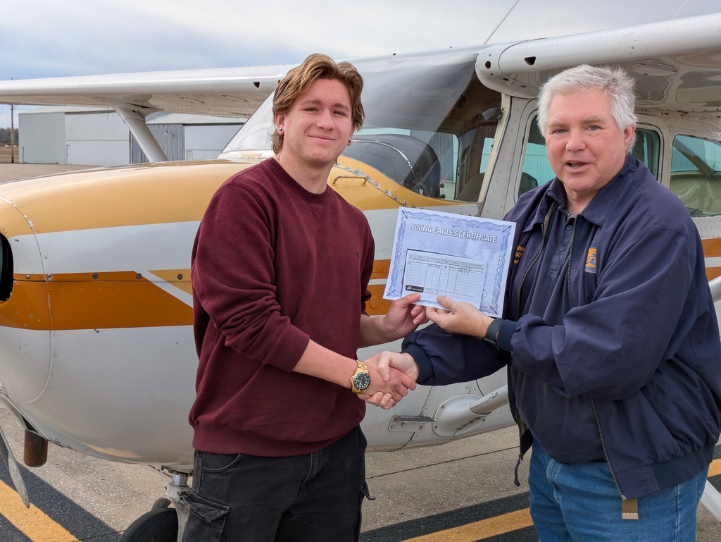 The photo shows a Pacific High School student who recently completed the SOAR into STEM aviation program.