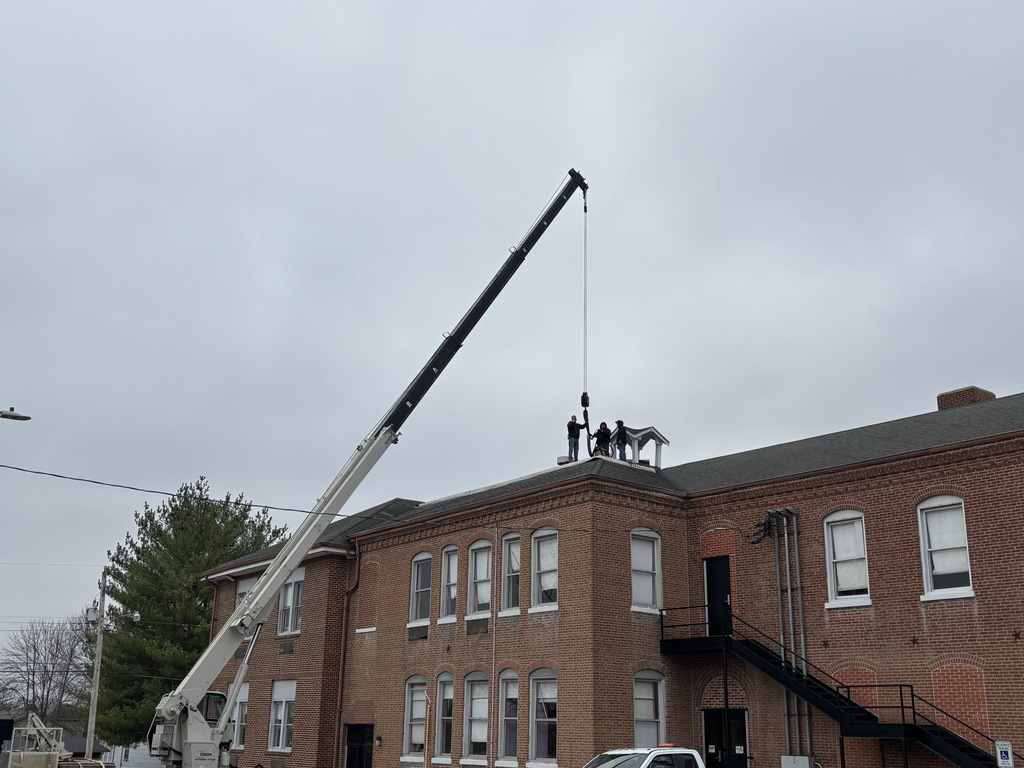 Photo shows the historic school bell which has been removed from the Community School as the property transitioned to new ownership