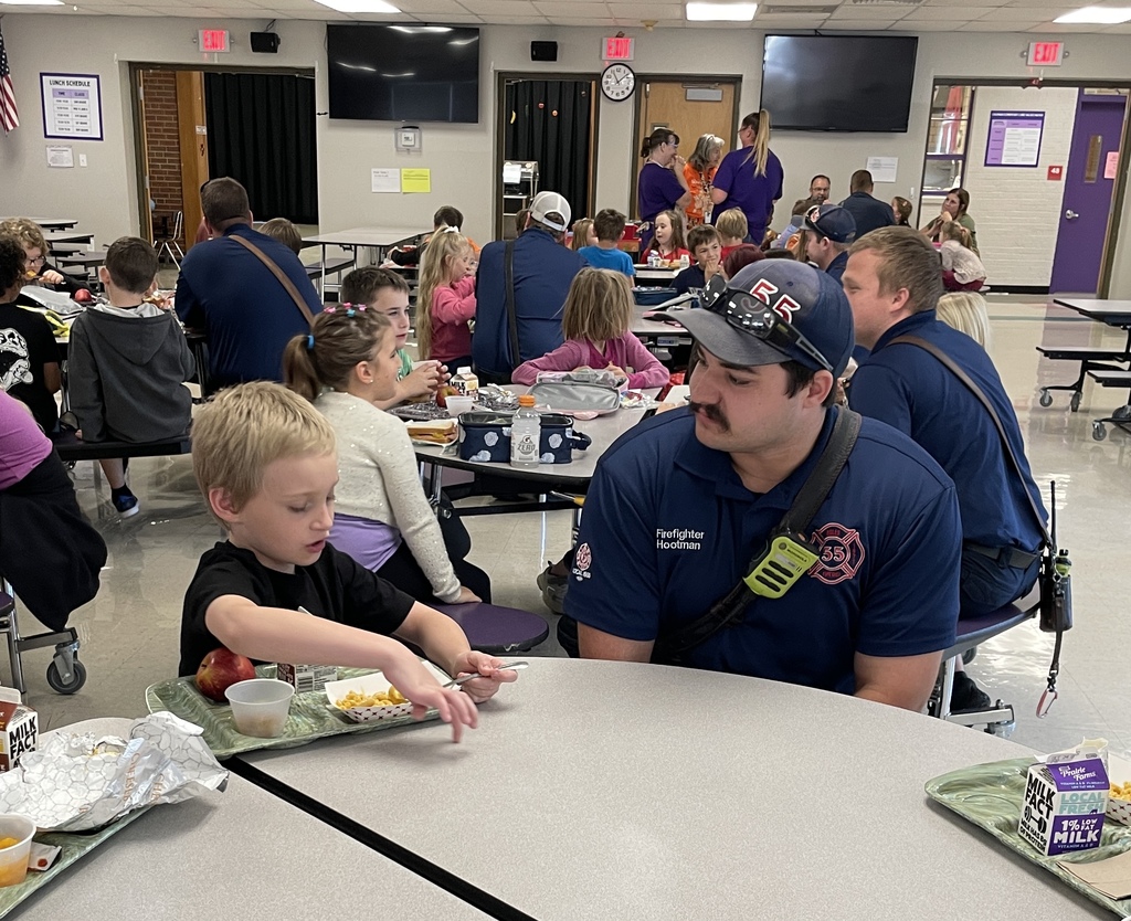 Photo shows a lunchtime visit from the Boles Fire Department to Coleman Elementary 