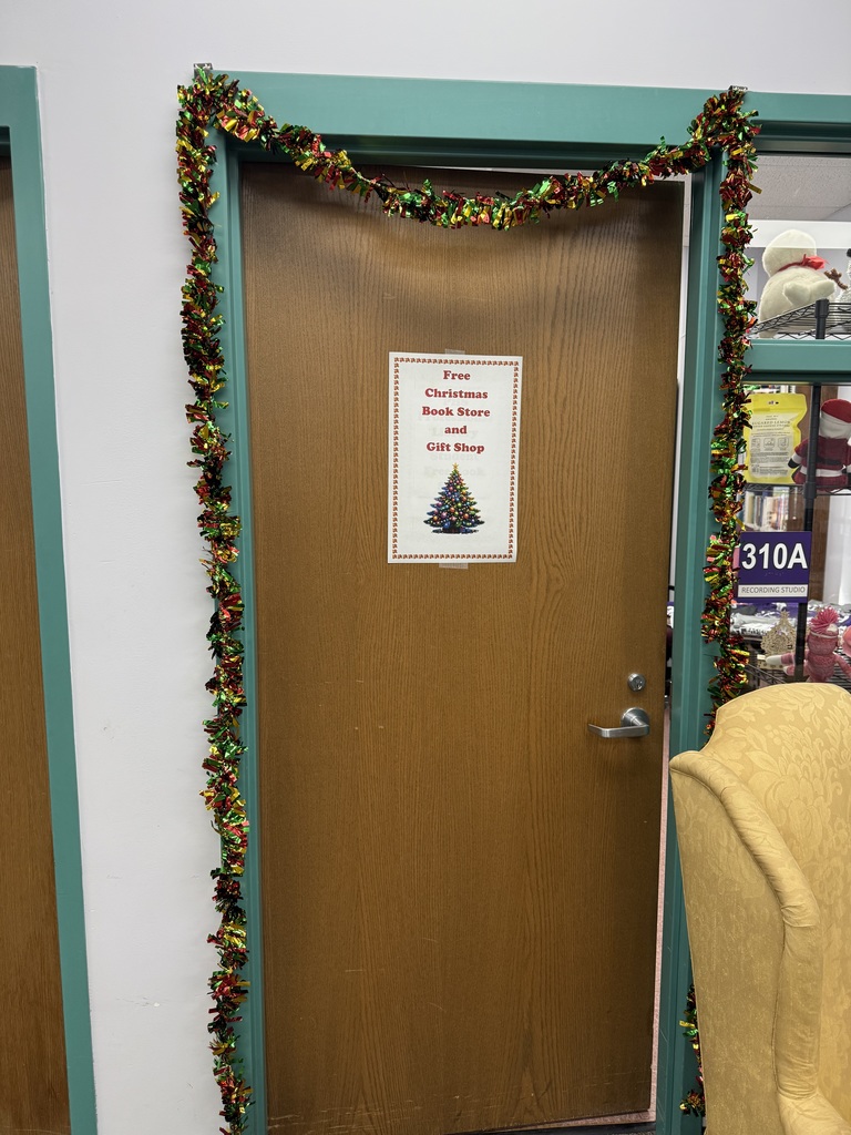 Photo shows the PHS Library which hosted the second annual Free Christmas Book Store & Gift Shop, giving students the opportunity to shop for family members and even wrap gifts right in the library