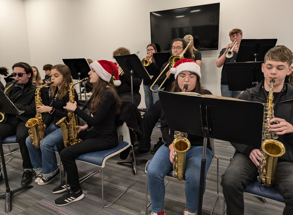 The photo shows the PHS Jazz Band performing at the Scenic Regional Library.