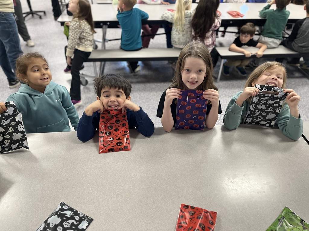 Photo shows Southpoint Assisted Living delivering special treat bags to kindergarteners at Zitzman Elementary