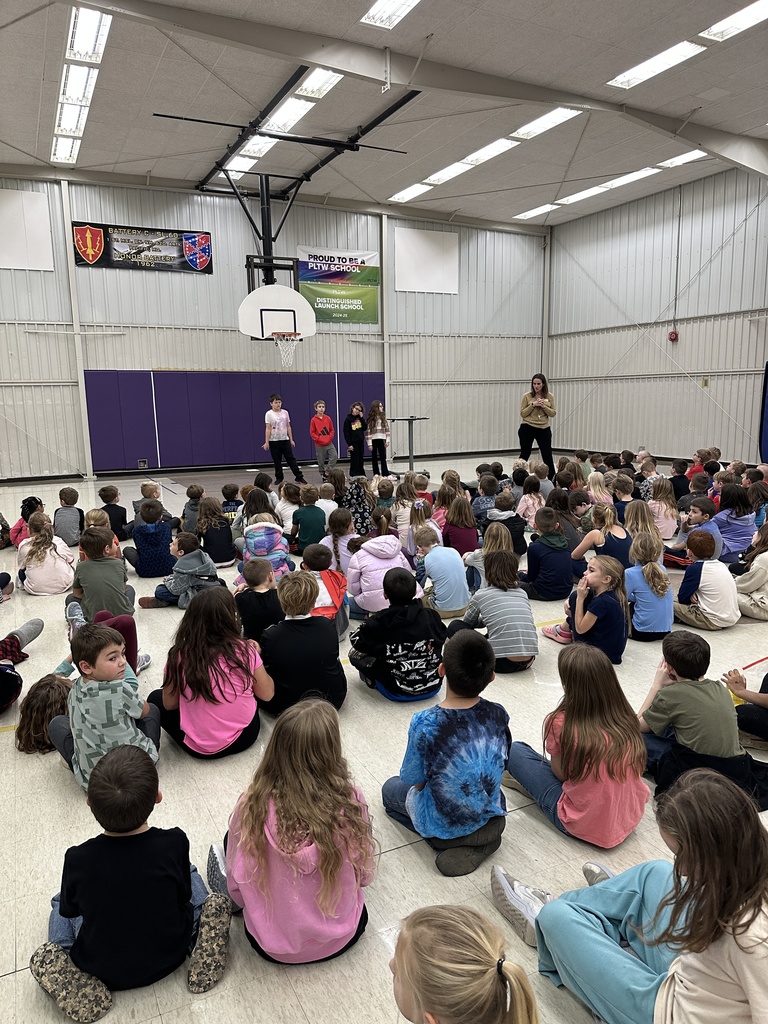 Student leaders speaking to the student body. 