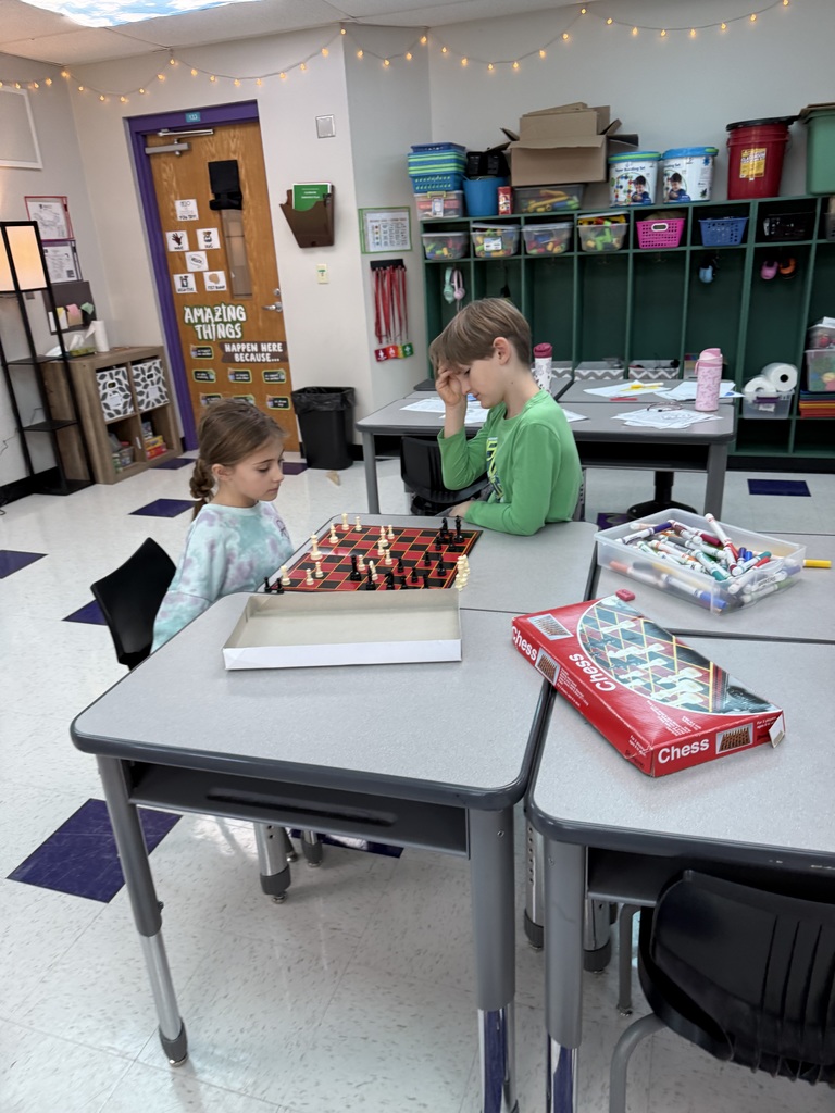 Students playing Chess games