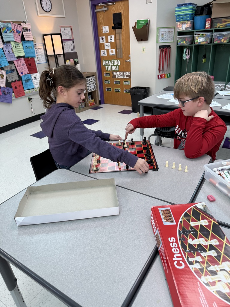 Students playing Chess games
