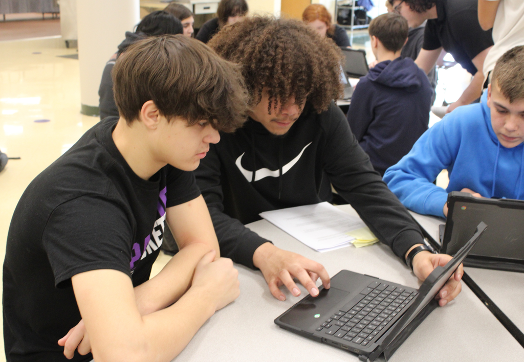 Pacific High School Ambassadors working with 8th grade students.