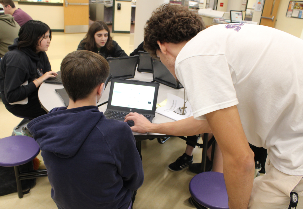 Pacific High School Ambassadors working with 8th grade students.