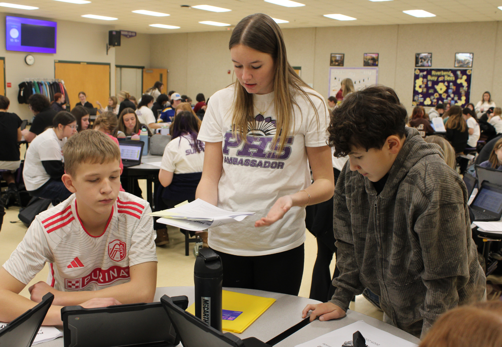 Pacific High School Ambassadors working with 8th grade students.
