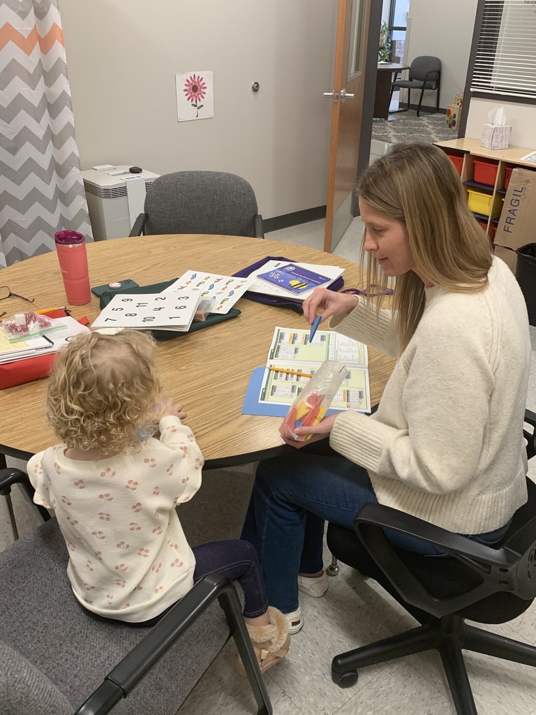 A parent going through a developmental screening with a child. 