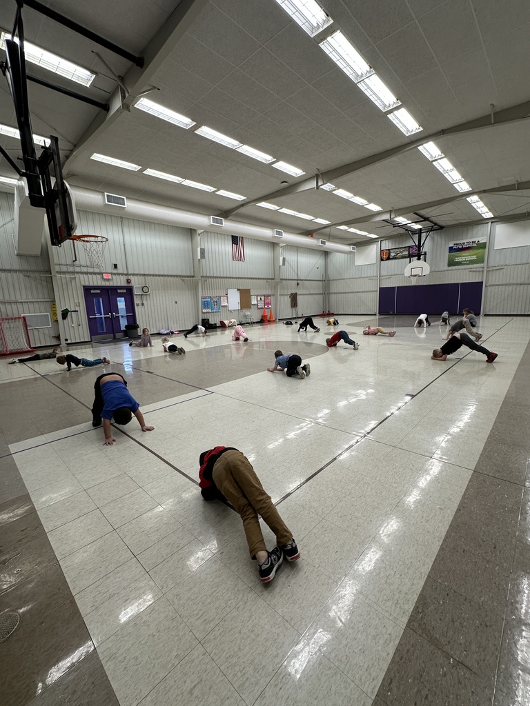 Students working on warm-up exercises. 