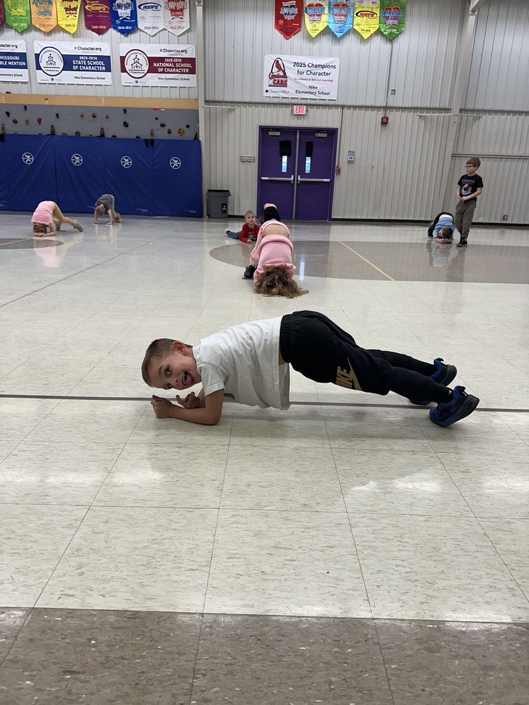 Students working on warm-up exercises. 