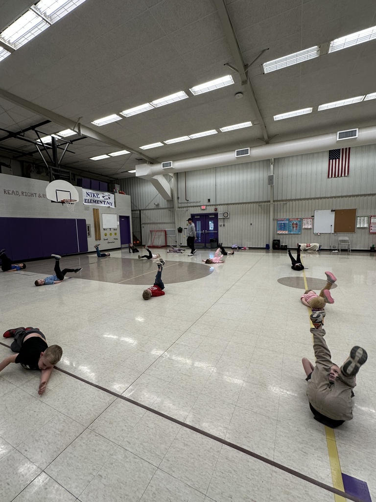 Students working on warm-up exercises. 
