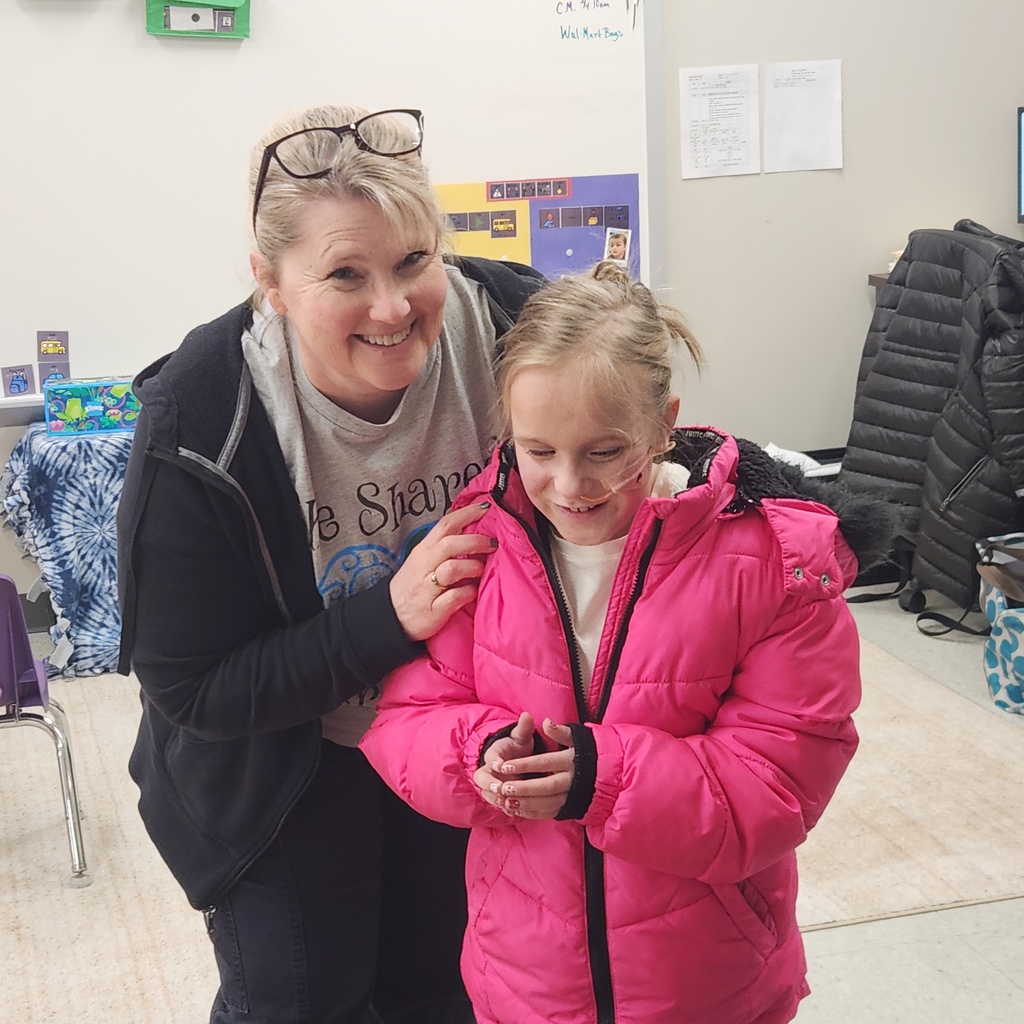 Robin and Kayleigh smiling for a photo.