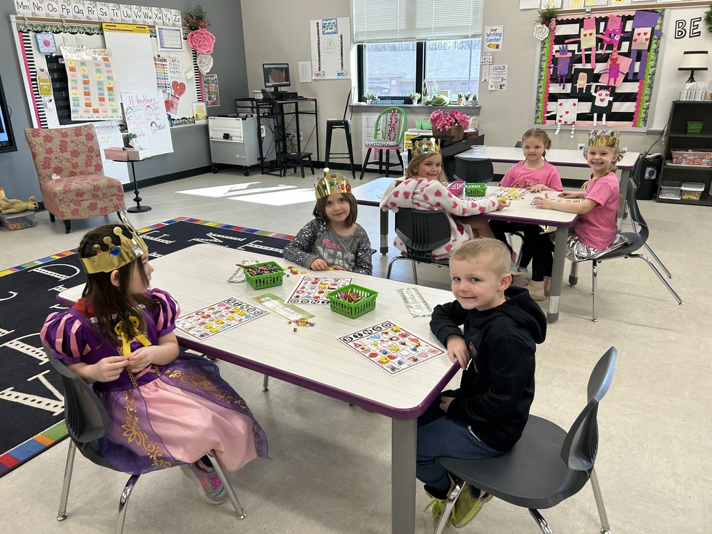 Students dressed up as Kings and Queens in an elementary classroom.