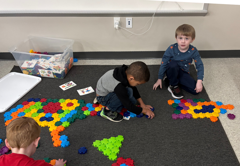 Students playing with building blocks.