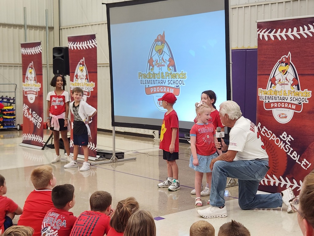Students participate onstage as a presenter speaks during the Fredbird & Friends Elementary School Program.
