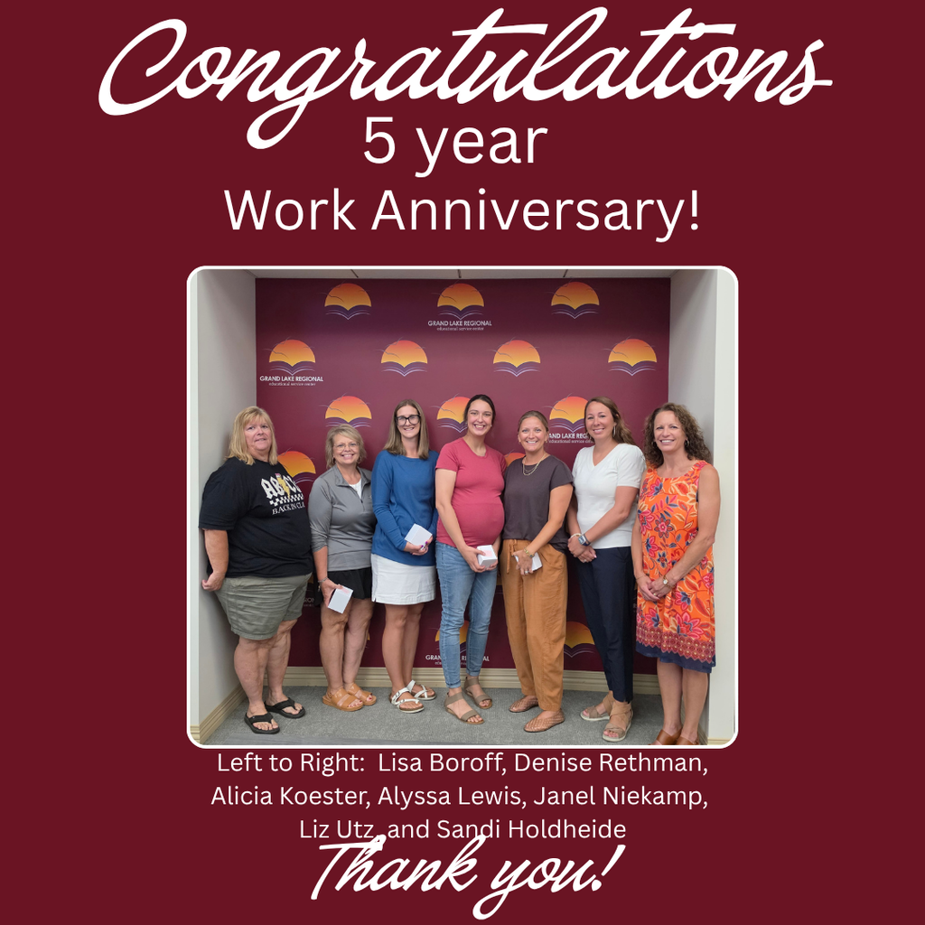 Six women stand together in front of a red background with text reading "Congratulations 5 year Work Anniversary!".