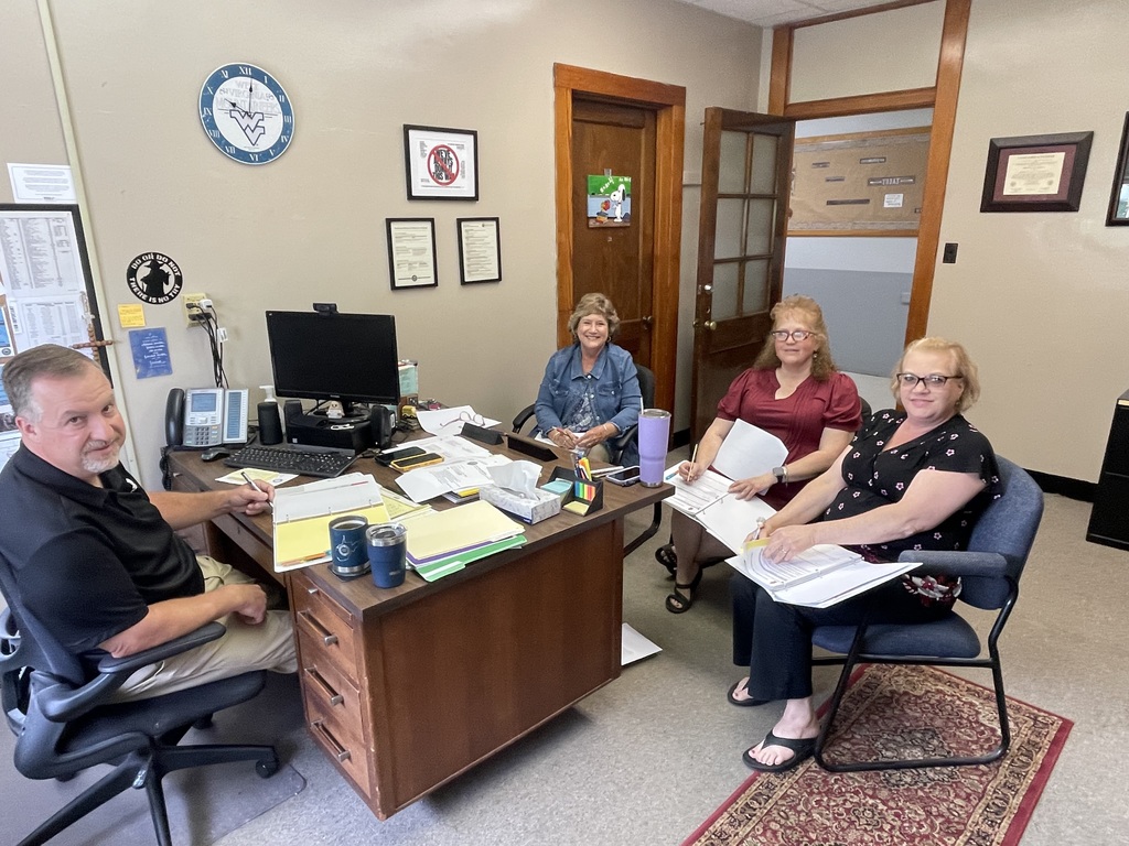 Title I staff meeting in Dr. Adkins' office