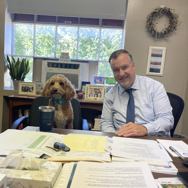 Dr. Adkins and Oakvale’s therapy dog