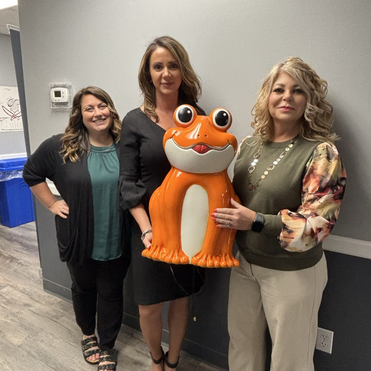 central office staff promoting the “Orange Frog” happiness project  