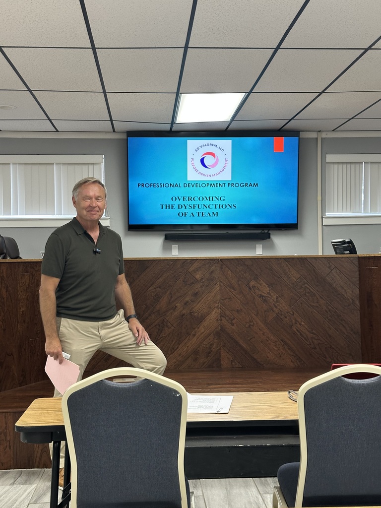 Mike McClanahan of Ad Valorem, LLC providing training to Central Office staff on Overcoming the Dysfunctions of a Team
