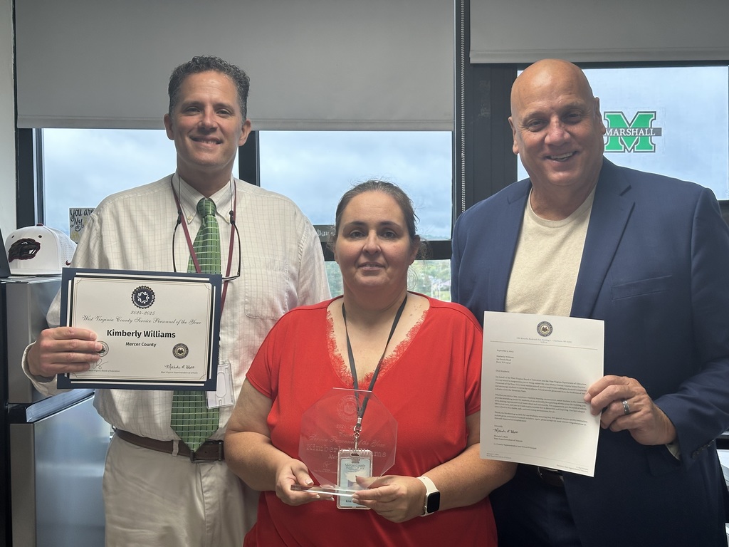 Service Person of the Year Kim Williams, Michael Collins, and Mr. Toman