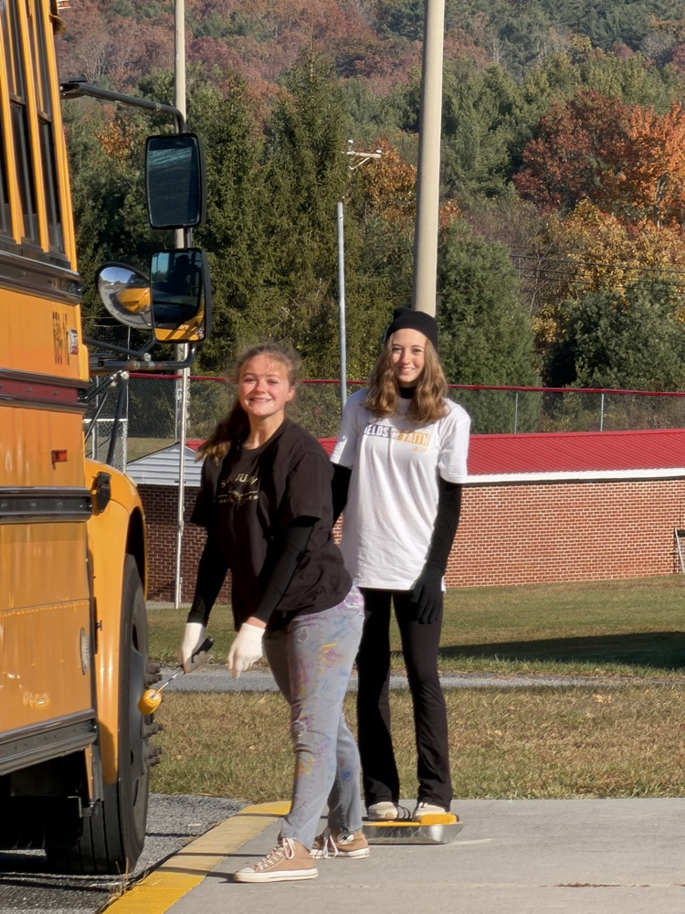 PV students painting a curb
