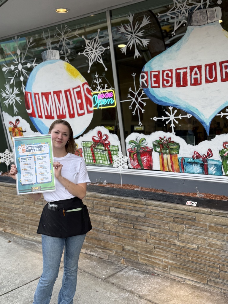 Local business displaying our attendance matters poster