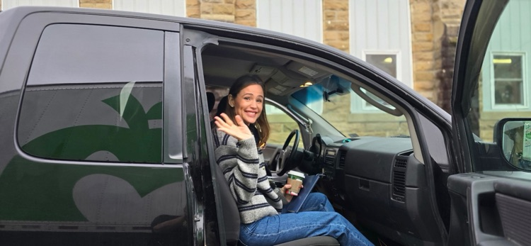 Actress Jennifer Garner helping Mountaineer Food Bank packing Thanksgiving boxes for families in need