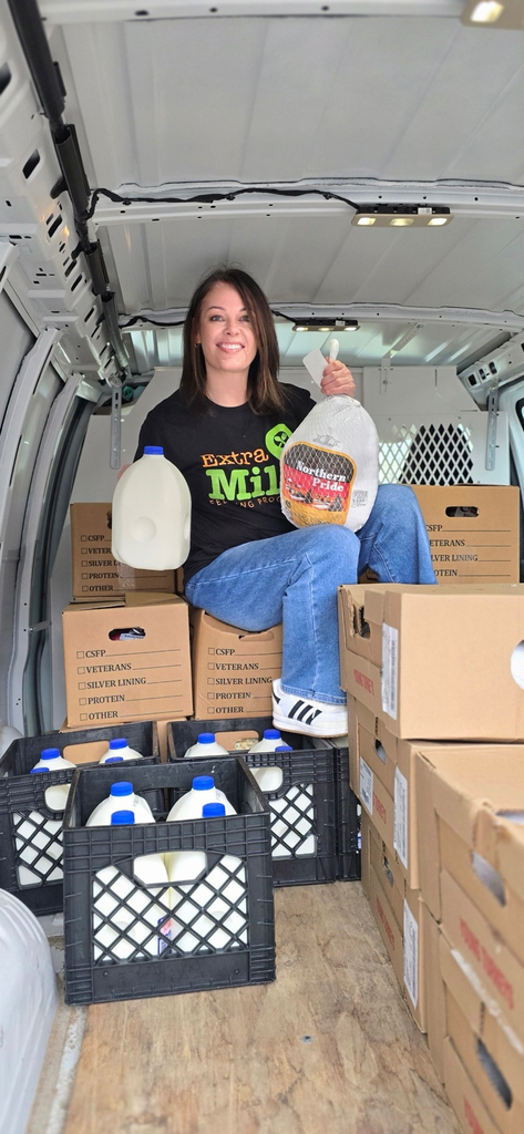 Actress Jennifer Garner helping Mountaineer Food Bank packing Thanksgiving boxes for families in need