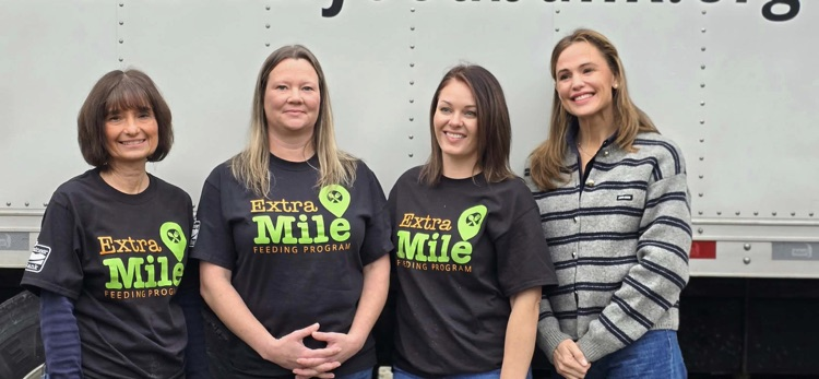 Actress Jennifer Garner helping Mountaineer Food Bank packing Thanksgiving boxes for families in need