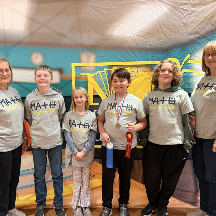 Mountain Valley’s entire Math Field Day Team. The picture has a woman coach on the left, a young man, a young lady,  two additional young men and another lady coach  
