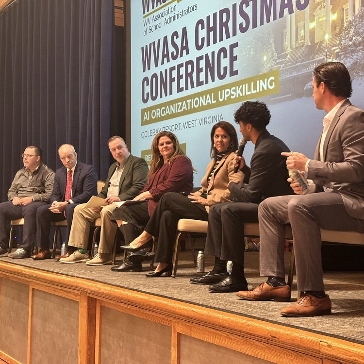 Dr. Adkins on stage at the WVASA conference  