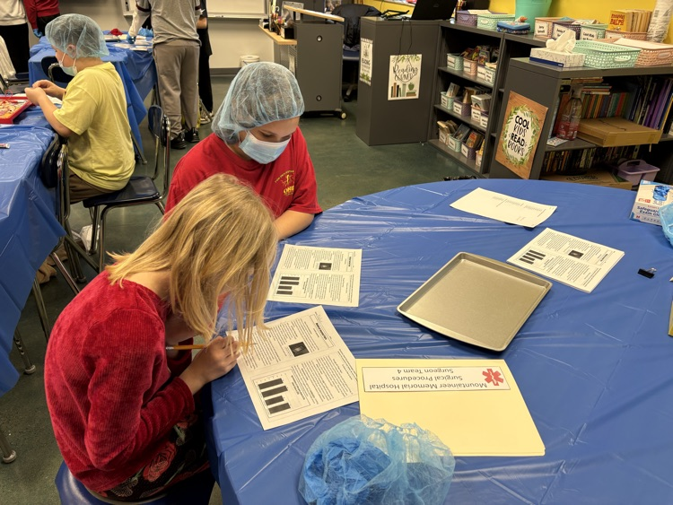 Fourth grade “scrubbed in” today to practice identifying and applying their knowledge of text features! 