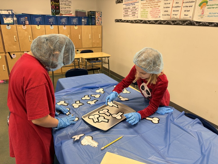 Fourth grade “scrubbed in” today to practice identifying and applying their knowledge of text features! 