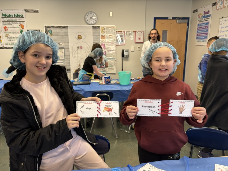Fourth grade “scrubbed in” today to practice identifying and applying their knowledge of text features! 