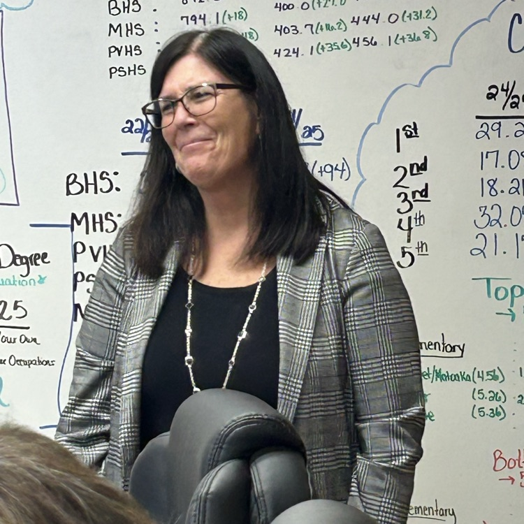 Julienne Smith being recognized as the Central Office Service Person of the Year