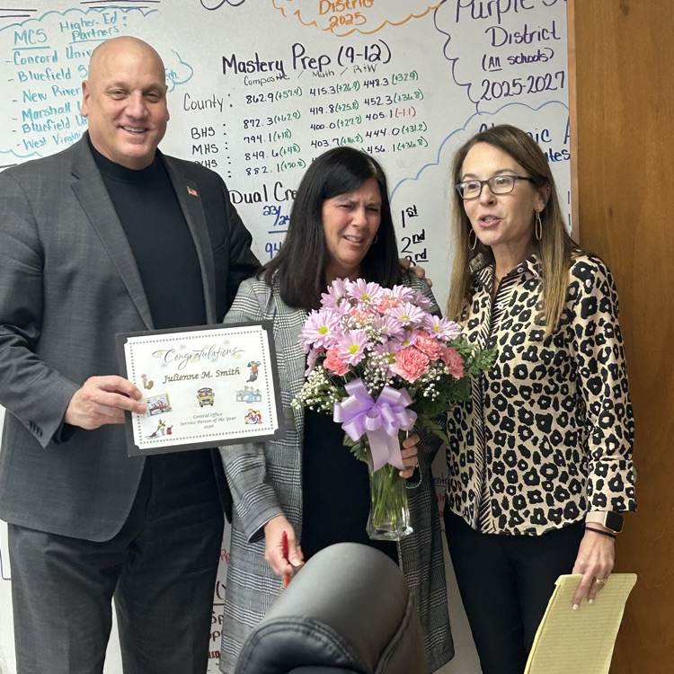 Julienne Smith being recognized as the Central Office Service Person of the Year
