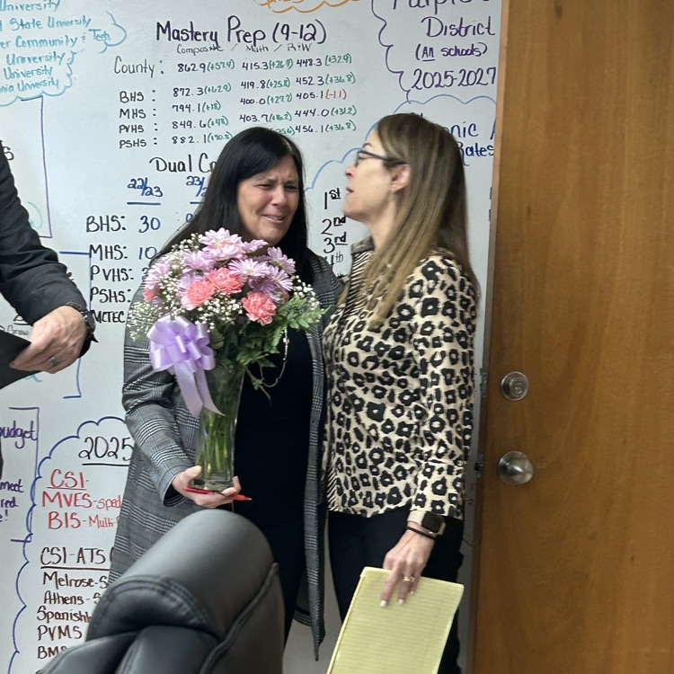 Julienne Smith being recognized as the Central Office Service Person of the Year