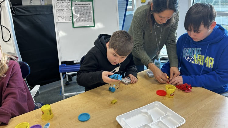 Learning was “electrifying” today! Students experimented with Squishy Circuits, using special conductive dough to build simple circuits that powered LED lights. A fun way to explore STEM in action!