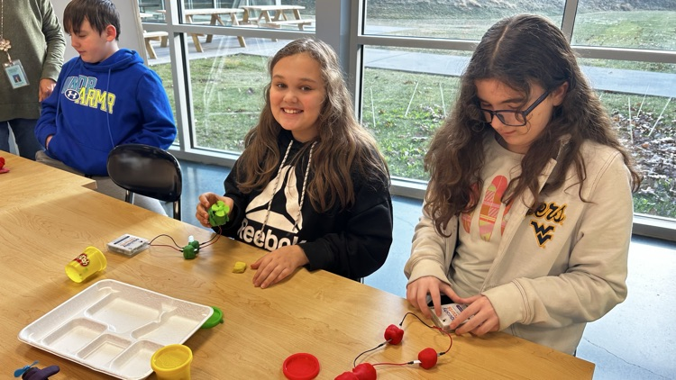 Learning was “electrifying” today! Students experimented with Squishy Circuits, using special conductive dough to build simple circuits that powered LED lights. A fun way to explore STEM in action!