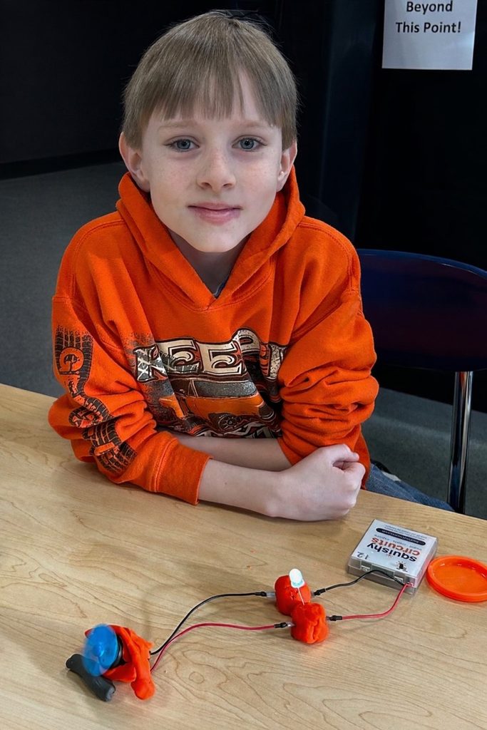 Learning was “electrifying” today! Students experimented with Squishy Circuits, using special conductive dough to build simple circuits that powered LED lights. A fun way to explore STEM in action!
