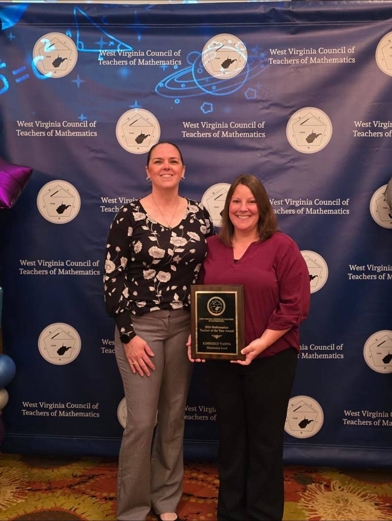 Athens Teacher, Kim Yahya and principal Shelley Weiss celebrating Mrs. Yahya's WV Math Teacher of the Year Award 