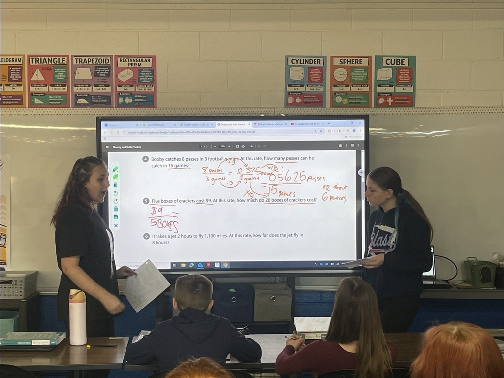 students teaching their peers 