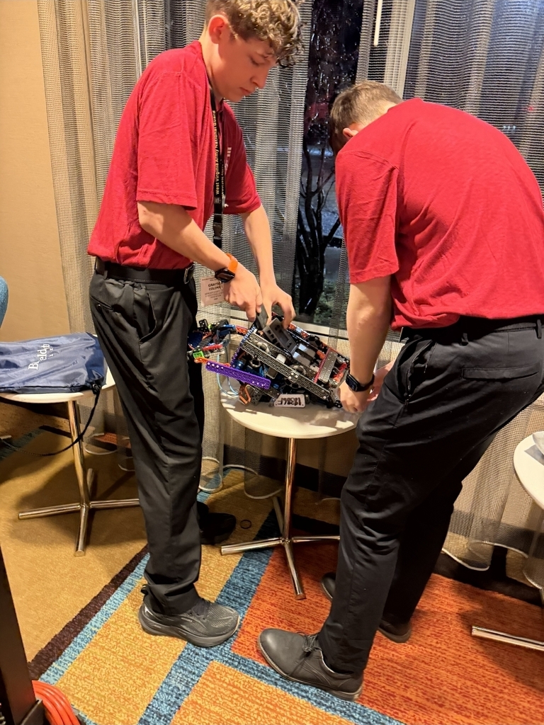 students working on robot