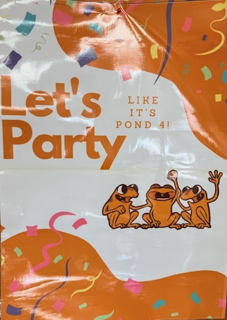 An orange frog sign that says "Let's Party like it's Pond 4"