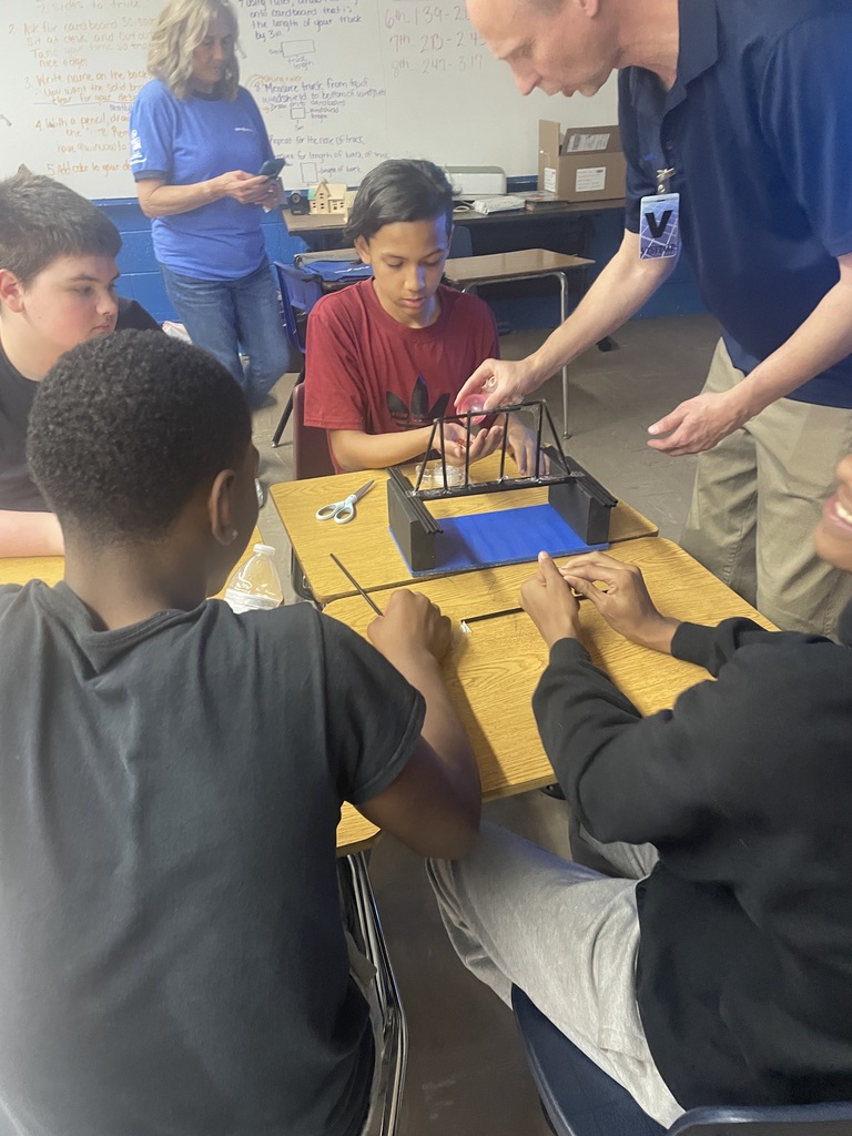 Conn-weld helping a student